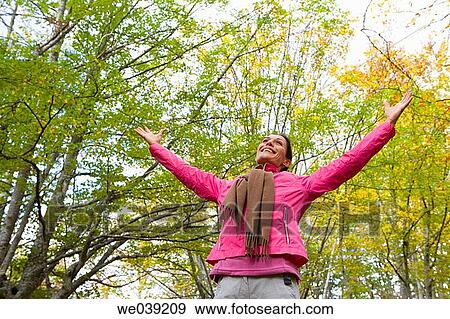 Stock Photo - autumn, Arms open. Fotosearch