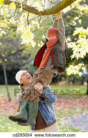 autumn, cap, branch, boy, amusement View Large Photo Image Picture - autumn, cap, branch, boy, amusement. Fotosearch