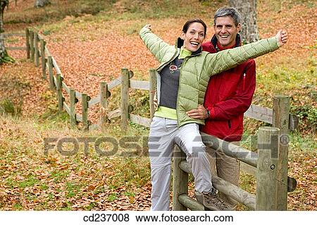 autumn, carefree, Arms open View Large Photo Image Stock Photo - autumn, carefree, Arms open. Fotosearch