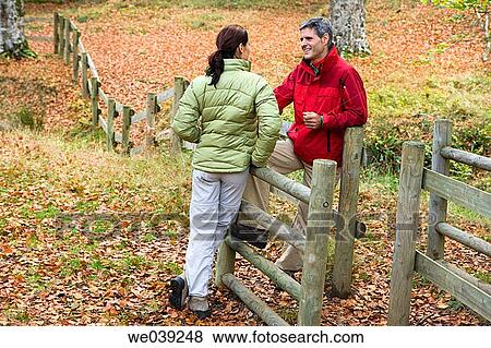Stock Photo - autumn, chat, anorak. Fotosearch