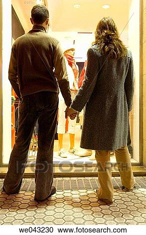 back view, Clothing store, contemporary, couple View Large Photo Image Stock Image - back view, Clothing store, contemporary, couple. Fotosearch