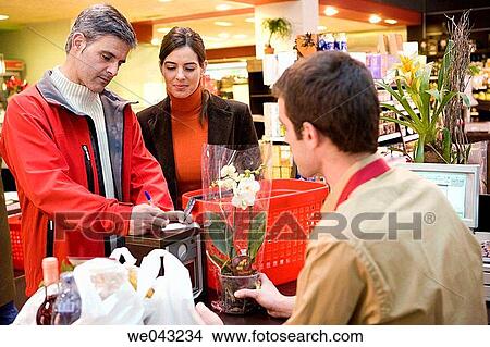 Picture - bag, basket, buy, buying, Cash register. Fotosearch