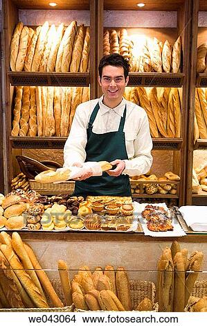 baker, black hair, bakery, Baker's shop, 30's View Large Photo Image Picture - baker, black hair, bakery, Baker's shop, 30's. Fotosearch
