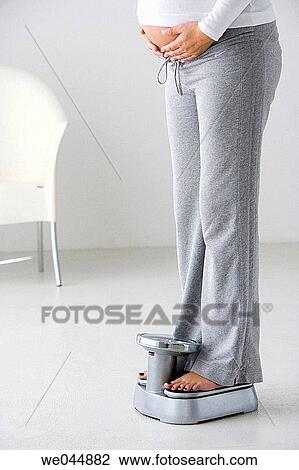 barefoot, contemporary, Bathroom scale, anonymous View Large Photo Image Stock Image - barefoot, contemporary, Bathroom scale, anonymous. Fotosearch