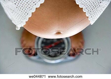 Bathroom scale, belly, contemporary, Female View Large Photo Image Stock Image - Bathroom scale, belly, contemporary, Female. Fotosearch