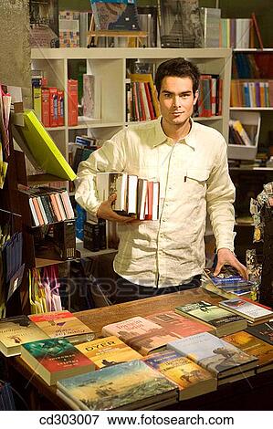 black hair, bookshop, book, 30's View Large Photo Image Stock Photo - black hair, bookshop, book, 30's. Fotosearch