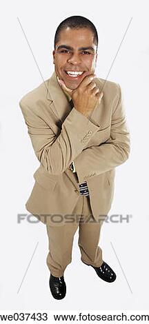 Stock Image - black hair, businesspeople, businessman, business, 30's. Fotosearch