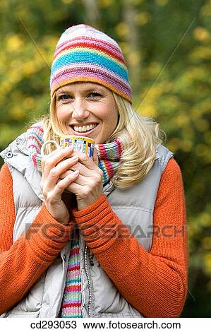 Stock Image - blond, cap, autumn. Fotosearch