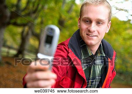blond, cell phone, camera, autumn View Large Photo Image Stock Photography - blond, cell phone, camera, autumn. Fotosearch