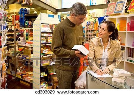 book, buying, buy, bookshop, 30's View Large Photo Image Stock Photo - book, buying, buy, bookshop, 30's. Fotosearch