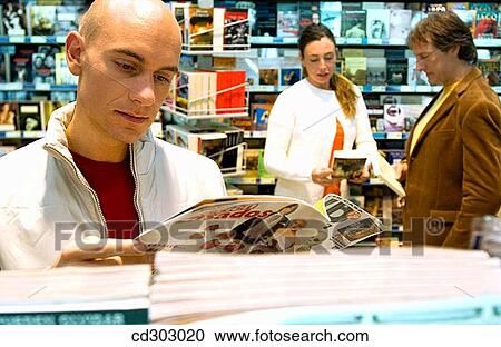 bookshop, browsing, browse, 30's View Large Photo Image Stock Image - bookshop, browsing, browse, 30's. Fotosearch