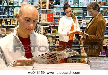 bookshop, browsing, browse, 30's View Large Photo Image Stock Photo - bookshop, browsing, browse, 30's. Fotosearch