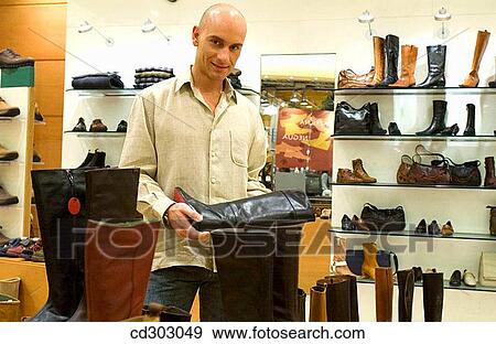 boot, choice, choosing View Large Photo Image Stock Photo - boot, choice, choosing. Fotosearch