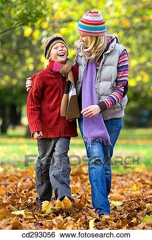 Stock Photograph - boy, chat, cap, autumn. Fotosearch