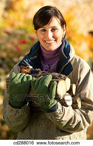 brunette, carrying, carry, autumn View Large Photo Image Stock Photograph - brunette, carrying, carry, autumn. Fotosearch