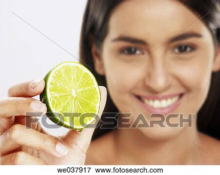 brunette, Citrus fruit, Close-up, contemporary View Large Photo Image Stock Photo - brunette, Citrus fruit, Close-up, contemporary. Fotosearch