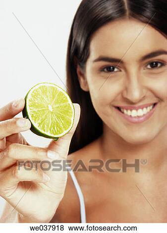 brunette, Citrus fruit, Close-up, contemporary View Large Photo Image Stock Photo - brunette, Citrus fruit, Close-up, contemporary. Fotosearch