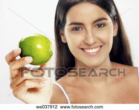 brunette, Citrus fruit, contemporary, dark hair View Large Photo Image Stock Image - brunette, Citrus fruit, contemporary, dark hair. Fotosearch