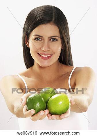 brunette, Citrus fruit, contemporary, dark hair View Large Photo Image Stock Photograph - brunette, Citrus fruit, contemporary, dark hair. Fotosearch