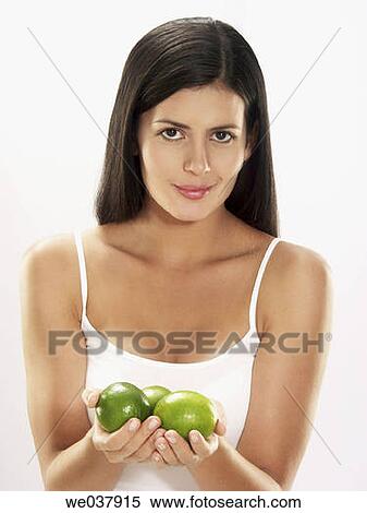 brunette, Citrus fruit, contemporary, dark hair View Large Photo Image Stock Photography - brunette, Citrus fruit, contemporary, dark hair. Fotosearch