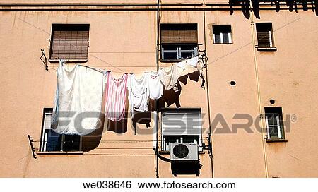 Stock Photograph - building, clothesline, clothes, city, arrangement. Fotosearch