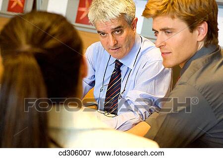 Stock Photo - business, businessman, businesspeople, businesswoman. Fotosearch