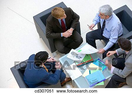 Stock Image - business, businesspeople, businessman, 30's. Fotosearch