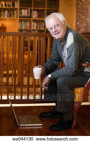 Stock Image - chair, computer, at-home. Fotosearch