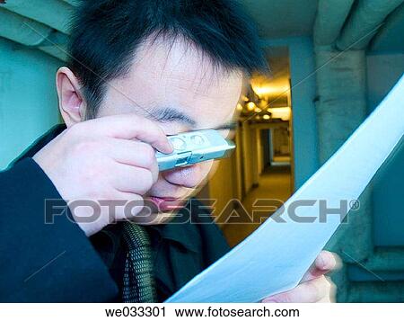 Chinese male in black shooting with a spy camera (minox). View Large Photo Image Stock Image - Chinese male in black shooting with a spy camera (minox).. Fotosearch