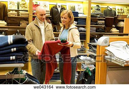 choice, Clothing store, choosing, 30's View Large Photo Image Picture - choice, Clothing store, choosing, 30's. Fotosearch
