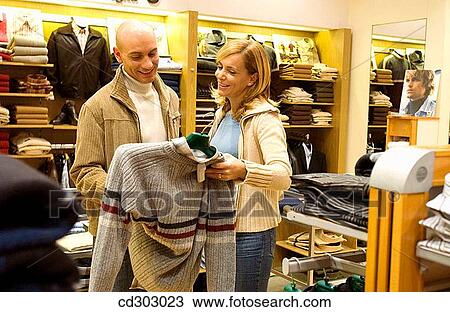 choice, Clothing store, choosing, 30's View Large Photo Image Stock Image - choice, Clothing store, choosing, 30's. Fotosearch