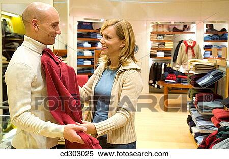 choice, Clothing store, choosing, 30's View Large Photo Image Stock Photography - choice, Clothing store, choosing, 30's. Fotosearch