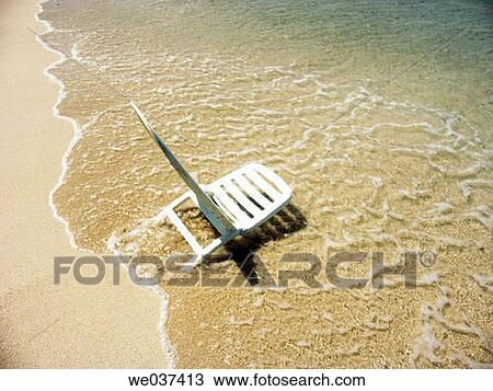 Stock Image - coast, absent, calm, beach chair, beach, absence. Fotosearch