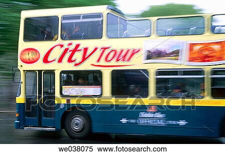 Double-decker tourist bus in the city centre. Dublin. Ireland. View Large Photo Image Stock Photography - Double-decker tourist bus in the city centre. Dublin. Ireland.. Fotosearch