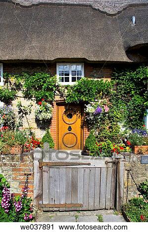 England, Sussex, Selsey, thatched cottage View Large Photo Image Stock Image - England, Sussex, Selsey, thatched cottage. Fotosearch