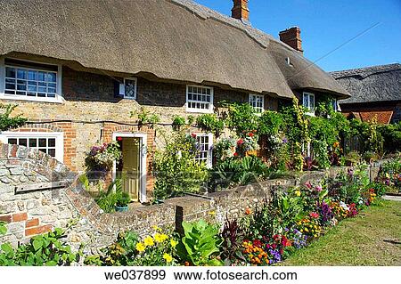 England, Sussex, Selsey, thatched cottage View Large Photo Image Stock Photo - England, Sussex, Selsey, thatched cottage. Fotosearch