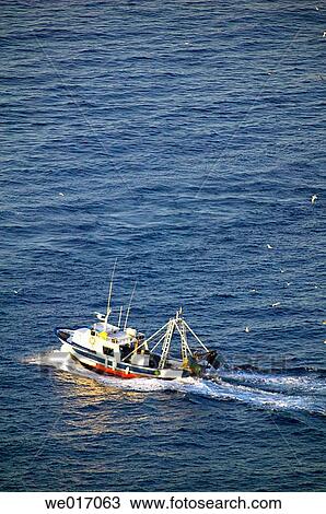 Fishing boat by Maro cliffs, Cerro Gordo area. Axarqu? a, Costa del Sol. Mßlaga province, Andalusia. Spain View Large Photo Image Stock Image - Fishing boat by Maro cliffs, Cerro Gordo area. Axarqu? a, Costa del Sol. Mßlaga province, Andalusia. Spain. Fotosearch