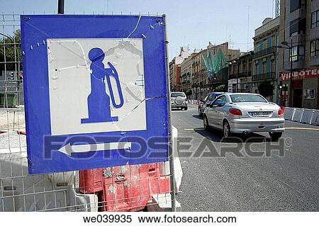 Gas station sign and cars passing by View Large Photo Image Stock Photography - Gas station sign and cars passing by. Fotosearch