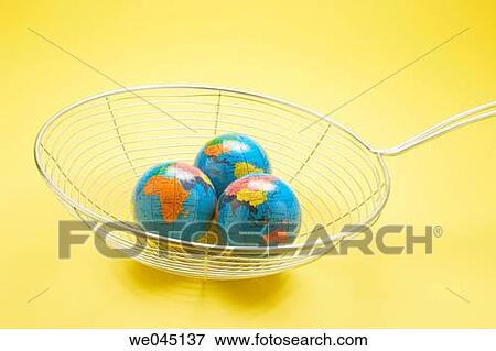 Globes in strainer View Large Photo Image Stock Photo - Globes in strainer. Fotosearch