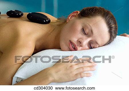 Hot stone massage. Thalassotherapy Zelai, Zumaia, Gipuzkoa, Basque Country View Large Photo Image Stock Image - Hot stone massage. Thalassotherapy Zelai, Zumaia, Gipuzkoa, Basque Country. Fotosearch
