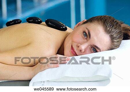 Hot stone massage. Thalassotherapy Zelai, Zumaia, Gipuzkoa, Basque Country View Large Photo Image Stock Photo - Hot stone massage. Thalassotherapy Zelai, Zumaia, Gipuzkoa, Basque Country. Fotosearch
