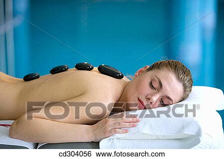 Hot stone massage. Thalassotherapy Zelai, Zumaia, Gipuzkoa, Basque Country View Large Photo Image Stock Photograph - Hot stone massage. Thalassotherapy Zelai, Zumaia, Gipuzkoa, Basque Country. Fotosearch