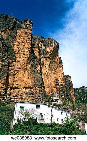 Mallos and Riglos village. Riglos. Prepirineo. Huesca. Arag? n. Spain. View Large Photo Image Stock Photo - Mallos and Riglos village. Riglos. Prepirineo. Huesca. Arag? n. Spain.. Fotosearch