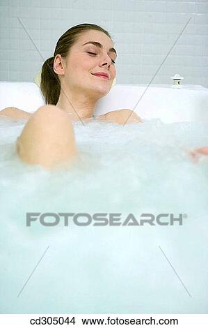 Multijet Jacuzzi with algae. Rich in iodine, minerals and trace elements. Stimulates the circulation and relaxes the muscles. View Large Photo Image Picture - Multijet Jacuzzi with algae. Rich in iodine, minerals and trace elements. Stimulates the circulation and relaxes the muscles.. Fotosearch