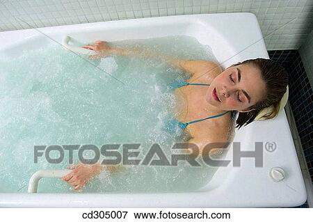 Multijet Jacuzzi with algae. Rich in iodine, minerals and trace elements. Stimulates the circulation and relaxes the muscles. View Large Photo Image Stock Photo - Multijet Jacuzzi with algae. Rich in iodine, minerals and trace elements. Stimulates the circulation and relaxes the muscles.. Fotosearch