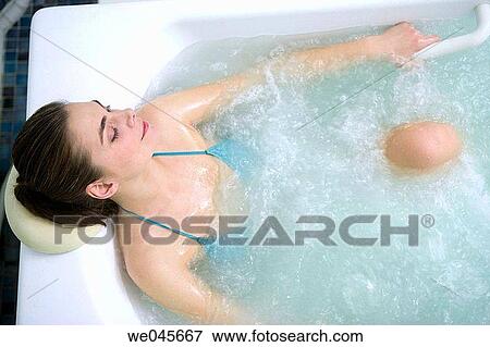 Multijet Jacuzzi with algae. Rich in iodine, minerals and trace elements. Stimulates the circulation and relaxes the muscles. View Large Photo Image Stock Photo - Multijet Jacuzzi with algae. Rich in iodine, minerals and trace elements. Stimulates the circulation and relaxes the muscles.. Fotosearch