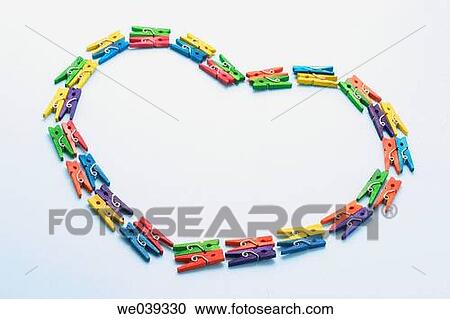 Pegs in heart shape View Large Photo Image Stock Image - Pegs in heart shape. Fotosearch