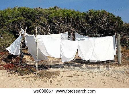 Sheets drying to the sun. Formentera. Balearic Islands. Spain. View Large Photo Image Stock Photo - Sheets drying to the sun. Formentera. Balearic Islands. Spain.. Fotosearch