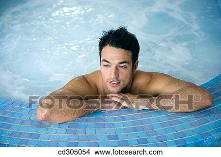 Therapeutic seawater pool (33? C) with hydrojet, underwater massage jets, waterfalls, bubbles, shoulder and neck massage waterfalls, jacuzzis, against-the-current swimming, and hot and cold plunge pools View Large Photo Image Picture - Therapeutic seawater pool (33? C) with hydrojet, underwater massage jets, waterfalls, bubbles, shoulder and neck massage waterfalls, jacuzzis, against-the-current swimming, and hot and cold plunge pools. Fotosearch