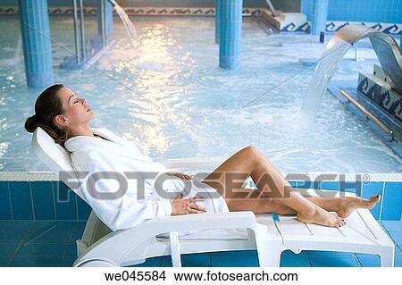 Picture - Therapeutic seawater pool (33? C) with hydrojet, underwater massage jets, waterfalls, bubbles, shoulder and neck massage waterfalls, jacuzzis, against-the-current swimming, and hot and cold plunge pools. Fotosearch